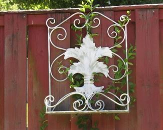Nice wrought iron - there's a pair of these wall pieces