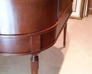 Rare Stunning Sligh Two-Tier English writing desk with leather top writing surface furniture of Holland, Michigan. The brass lock hardware accents the 9 drawers with original brass pulls. The curved back is beautifully finished so the desk can free-stand in a room. Lesser size listing as follows on another site...not same desk but same maker. https://www.1stdibs.com/furniture/tables/desks-writing-tables/sligh-walnut-curved-front-desk-leather-top/id-f_1141858/?gclid=Cj0KCQjwv8nqBRDGARIsAHfR9wCSzbjfRooPw17h1GRU9-mS9jtoJT_NI9xHfYXxVB7voUHKdIeTFxgaAhgsEALw_wcB&gclsrc=aw.ds