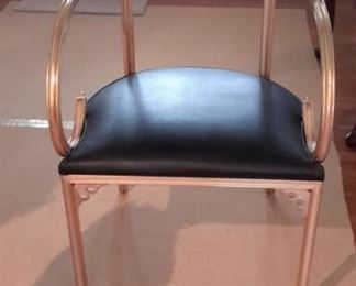 Mid Century Modern chair, with black vinyl seat back and seat. No tears or scratches, in excellent condition.