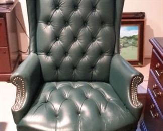 Large Ethan Allen Wing Back green leather tufted swivel office chair with nail head trim, in excellent condition.