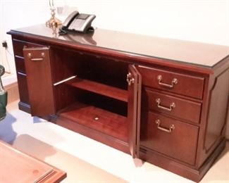 Credenza cabinet with 2 drawers, 2 file drawers and storage center.