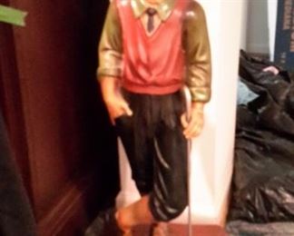 Golfer statue