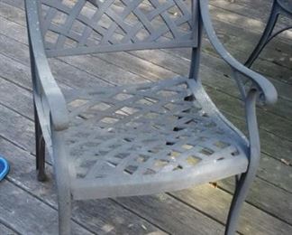 Cast aluminum patio table and 4 chairs.