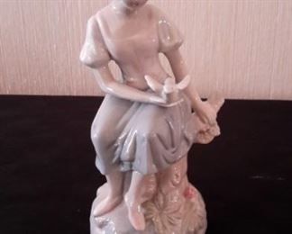 Lladro style figurine.