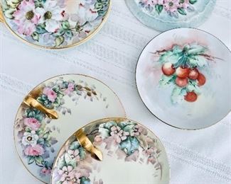 Vintage porcelain plates and serving pieces