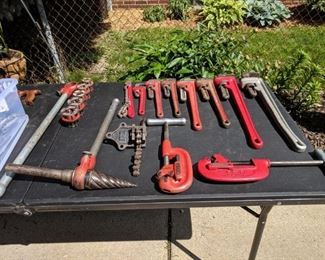 Pipe dies, reamers, wrenches, and cutters.