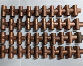 Half-inch copper tee's New old stock.