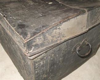 Tin trunk.