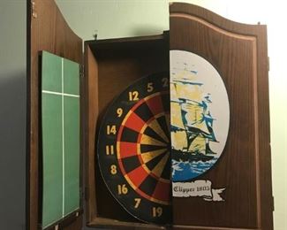 Great dart board w/decorative cover, score-keeping board, and holders for darts, etc. 