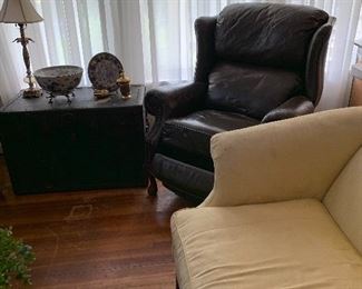 Trunk, leather recliner, and sofa. This sofa has great bones and would be awesome recovered