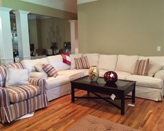 Beautiful sectional, club chairs, display case coffee table, decor
