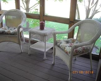 Wicker Look table and chairs.  Excellent condition.  Asking $100