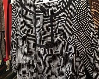 MOST CLOTHING IS IN WOMEN'S LARGE OR SIZE 12.
