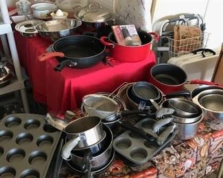 SUCH A LARGE SUPPLY OF POTS AND PANS, BAKERS, ETC., THAT WE HAD TO PUT THEM OUT IN THE GARAGE.