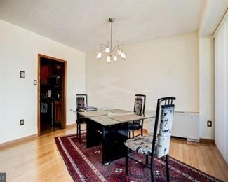 glass dining room table, with 4 chairs, Persian wool rug