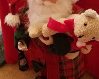 Santa holding a teddy bear