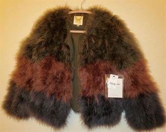 New from Sweeden-Ostrich/Maribou feathers that are tri colored and lined...