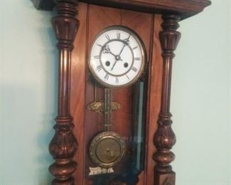 Smaller of the two German antique wall clocks