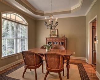 Paradise dining room set. Table, two leaves, 6 chairs and a wonderfully unique china cabinet that doesn't look like one! A Tommy Bahama look!