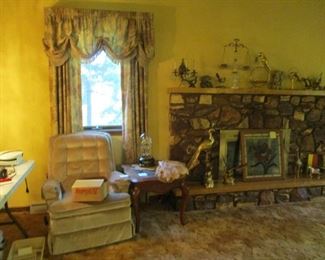 Chair, table, brass figurines