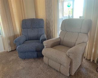 Blue and beige rocker recliners