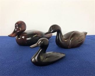 carved wooden ducks