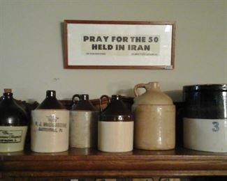 Many antique jugs and crocks
