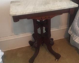 Marble Topped Rolling Eastlake Table