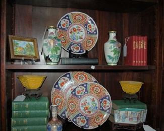 Antique books and mustard porcelain bowls