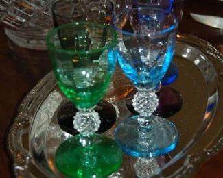 Cordial glasses on silver-plate
