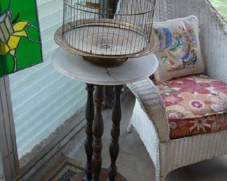 Antique birdcage and stained glass