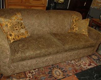 One of several upholstered sofas