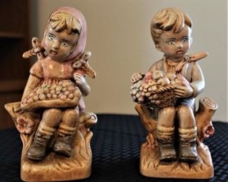 Unique, porcelain boy and girl figurines.