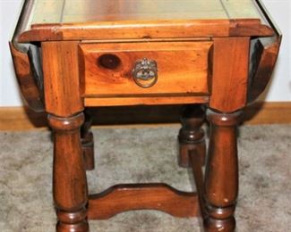 Early American end table with drop leaf sides.