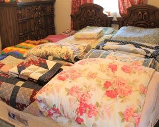 Lots of nice comforters and bedspreads in like new condition.