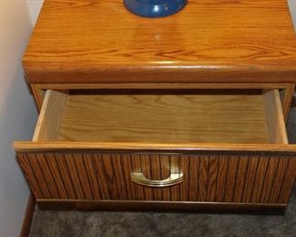 Night stand drawer open.  Nice and clean.