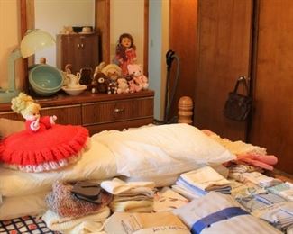 Linens, pillows and dolls, oh my!