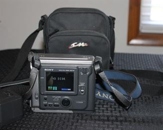 Sony digital camera with case.