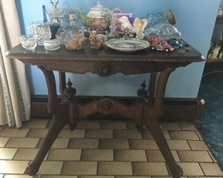 This lamp table has beautiful finials and dates back to the 1800's according to the owner.