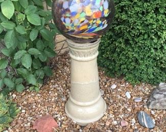 . . . a beautiful globe on cement base