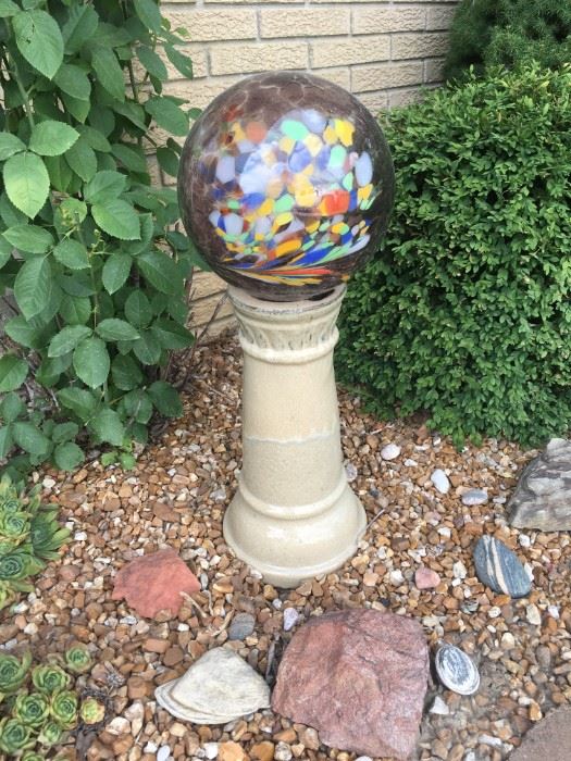 . . . a beautiful globe on cement base