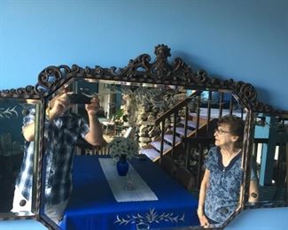 . . . I love this mirror -- these were often placed above a headboard but can be used anywhere -- ignore goofy guy -- can you guess who the celebrity on the right is?