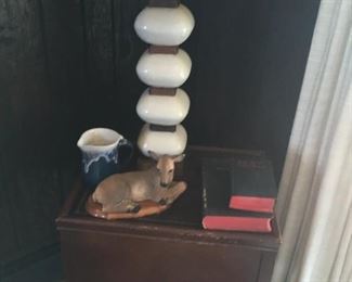 . . . a lamp table and one of a pair of retro lamps