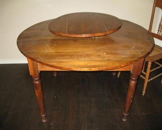 antique table with lazy Susan