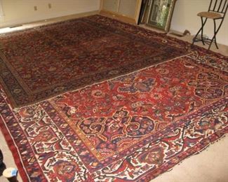 Smaller rug on top is 9'3" x 11'8"