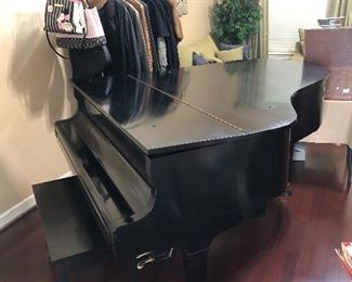 Closed Howard grand piano
