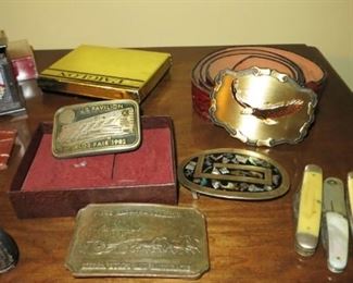 Vintage belt buckles, pocket knives, cast iron whale