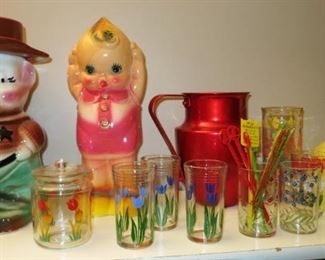 Cookie Jar, chalkware Kewpie, metal aluminum pitcher, printed glasses and tulip covered dish, Pyrex bowl, sifter