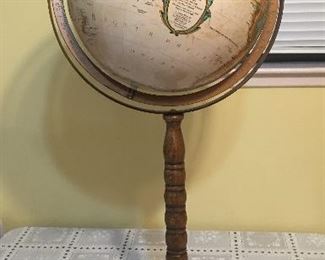 Replouge globe on wood stand