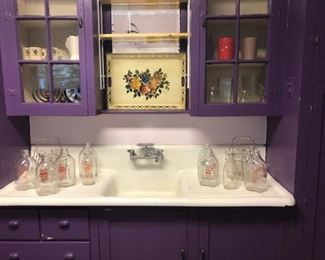 Vintage milk bottles (and one funky purple cabinet!).